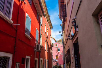 Fototapeta na wymiar ROVINJ, CROATIA, 14 AUGUST 2019: Beautiful and colorful street in the old town