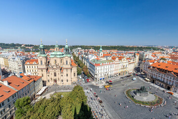 Fototapeta na wymiar Landscape view of the old town square and the Saint Nicholas Church from the Astronomical Clock in Prague.