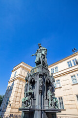 Fototapeta na wymiar Krizovnicke Namesti Statue at the entrance to the Charles Bridge in Prague.