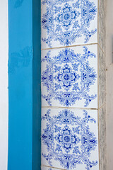 Portuguese tiles decorated with blue arabesques