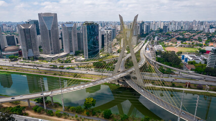 Fototapeta na wymiar Estaiada's bridge aerial view in Marginal Pinheiros, São Paulo, Brazil. Business center. Financial Center. Famous cable stayed (Ponte Estaiada) bridge