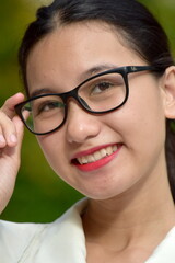 Portrait Of A Female Woman Wearing Glasses