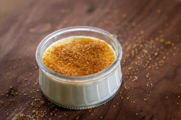 Tasty Dish of Creme Brûlée French Dessert in a Glass Bowl