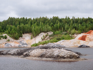 A deposit of refractory clay. A quarry for the extraction of natural resources
