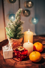 Christmas decor with candles and gifts