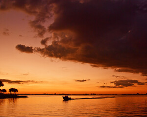 Fototapeta na wymiar Boat at the sunset beautiful seascape