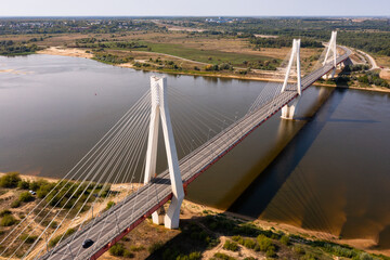 Obraz premium Drone view of the summer landscape of the Oka River and the cable-stayed Muromsky Bridge, Russia