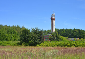 Fototapeta na wymiar Light house in Niechorze, Poland, tourist attraction in west pommerania