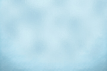 Blue foil freeze gradient texture background. Blue ice or Frost texture. Frost texture iced surface, Winter material. Abstract frosty pattern on glass. Frosted glass. The frozen water.