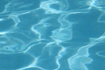 Blue moving water in the pool