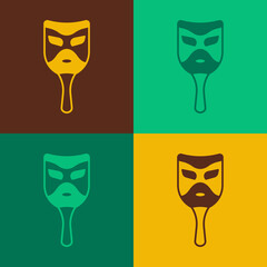 Pop art Carnival mask icon isolated on color background. Masquerade party mask. Vector