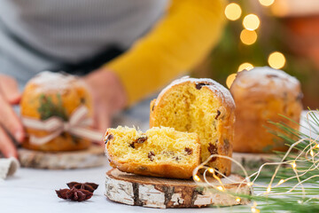 Traditional Italian Christmas cake Panettone with festive decorations 