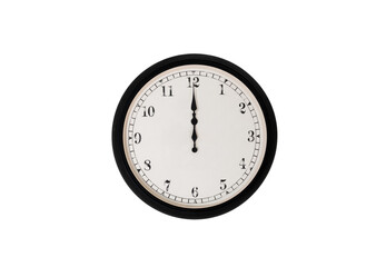 Classic analog wall clock showing twelve o'clock isolated on white background. 