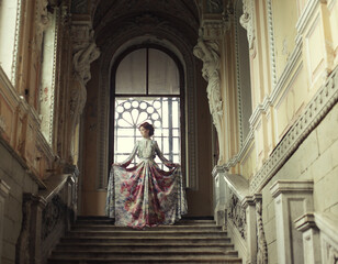 woman standing on the top of a stairway