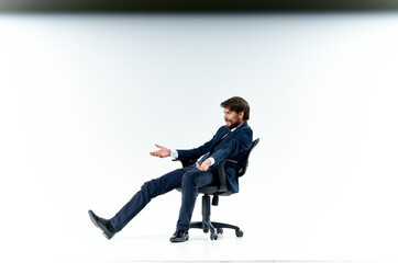 business man sitting in office chair working isolated background