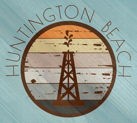 Huntington Beach oil derrick label on wood grain texture