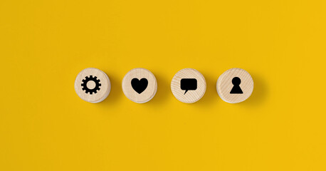 The circular wooden block is placed on a yellow background, on the wooden block there is a contract...