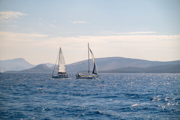 Fototapeta premium Catamaran sail Yacht cruising on deep blue sea water