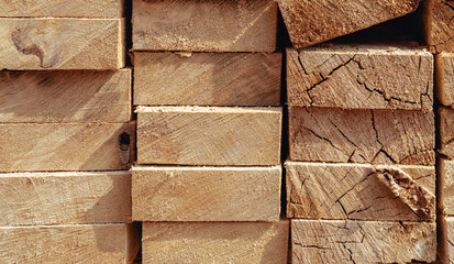 Texture of stacked lumber for background. Folded wood.Lumber for use in construction