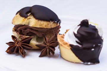 cream and chocolate cakes isolated