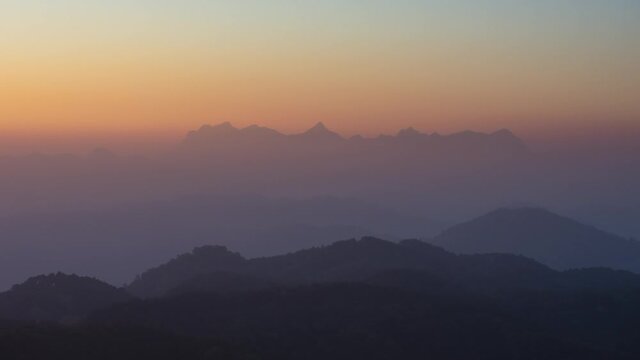 Time Lapse, a lovely winter scene. Beautiful landscape at Doi Kham Fah Viewpoint in Padaeng National Park, Chiang Mai, with Chiang Dao Mountain in the background. One of Thailand's most spectacular.