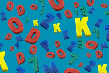 Background, banner and wallpaper for design. Colorful 3d letters and numbers at different angles, chaotically on a blue background. Pattern