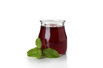 Jar of raspberry jam isolated on white background
