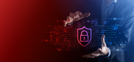 Protection network security computer and safe your data concept, Businessman holding shield protect icon. lock symbol, concept about security, cybersecurity and protection against dangers - obrazy, fototapety, plakaty