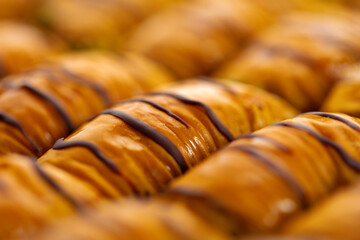 Turkish baklava dessert with honey, close up