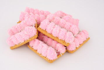 Group of jam mallows soft crumbly biscuits topped with pink mallow and raspberry flavour jam sprinkled with coconut