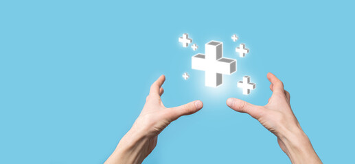 Hand hold 3D plus icon, man hold in hand offer positive thing such as profit, benefits, development, CSR represented by plus sign.The hand shows the plus sign