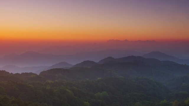 Time Lapse, a lovely winter scene. Beautiful landscape at Doi Kham Fah Viewpoint in Padaeng National Park, Chiang Mai, with Chiang Dao Mountain in the background. One of Thailand's most spectacular.