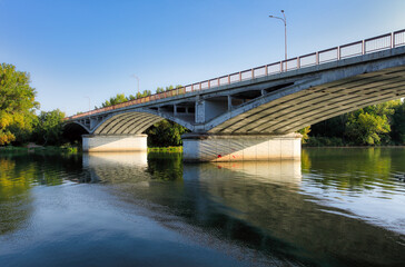 Fototapeta na wymiar Bridge over river Vah in city Sered in Slovakia