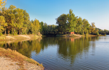 Lake reflection with tree in Sered, Slovakia