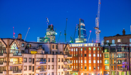Fototapeta na wymiar London night skyline with blue sky.