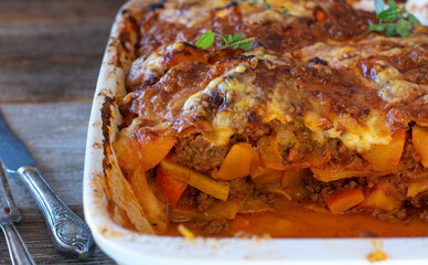Casserole with ground beef, pumpkin, vegetable and mozzarella cheese