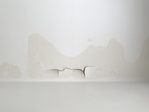 whitewash and plaster of ceiling crack and break from rain leakage from roof or top floor