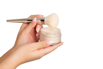 Woman hand holding loose powder