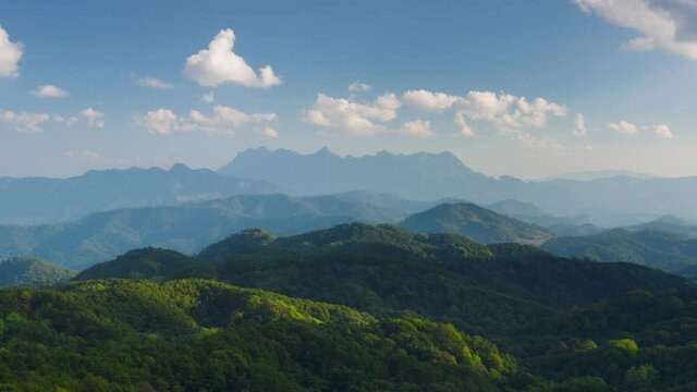 Time Lapse, a lovely winter scene. Beautiful landscape at Doi Kham Fah Viewpoint in Padaeng National Park, Chiang Mai, with Chiang Dao Mountain in the background. One of Thailand's most spectacular.