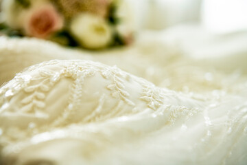 Wedding preparation, dress and bridal bouquet
