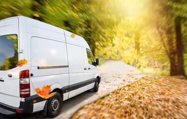 White van on a country road in autumn © Soho A studio