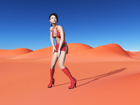 Gutaussehende junge Frau posiert im sexy outfit in einer Sandwüste
