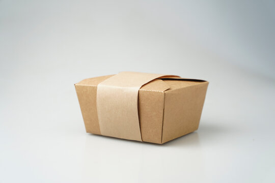 Take Away Box Disposable Food Container Craft Paper Mock Up And Cover On Grey Background With Copy Space. Delivery Food Concept.