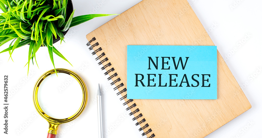 Poster notebook with tools and notes with text on the blue sticker new release