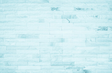 Pastel Blue and White brick wall texture background. Brickwork painted of blue color interior rock old pattern clean concrete grid uneven brick design stack. Home or office design backdrop decoration.