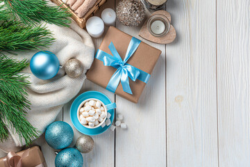 Merry Christmas and Happy New Year. Festive background with a cup of coffee and Christmas decorations.