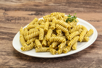 Italian pasta Fusilli with pesto