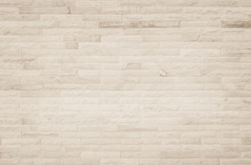 Cream and white brick wall texture background. Brickwork and stonework flooring interior rock old...