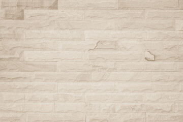 Cream and white brick wall texture background. Brickwork and stonework flooring interior rock old pattern 