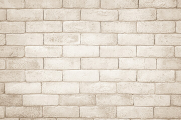 Cream and white brick wall texture background. Brickwork and stonework flooring interior rock old pattern 
